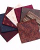 Manufacturer of men's business suit pocket squares, patterned wedding handkerchiefs, and small square handkerchiefs for banquets and suit accessories.